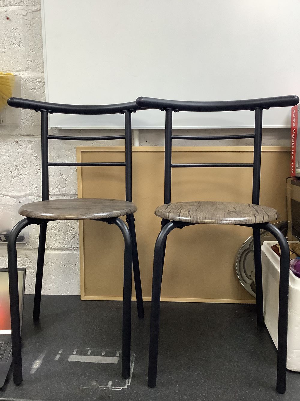 Lot 218: A Pair of Black Metal and Wood Effect Bar Stools