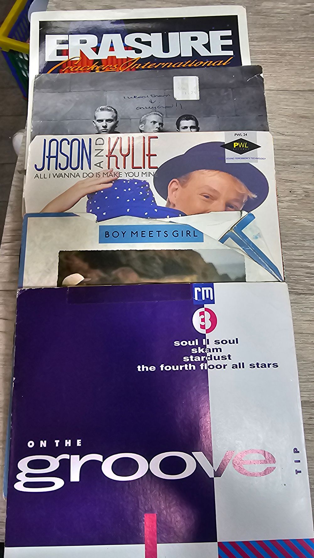 Lot 237: Four 7 Inch Vinyl Singles inc Erasure and Jason and Kylie