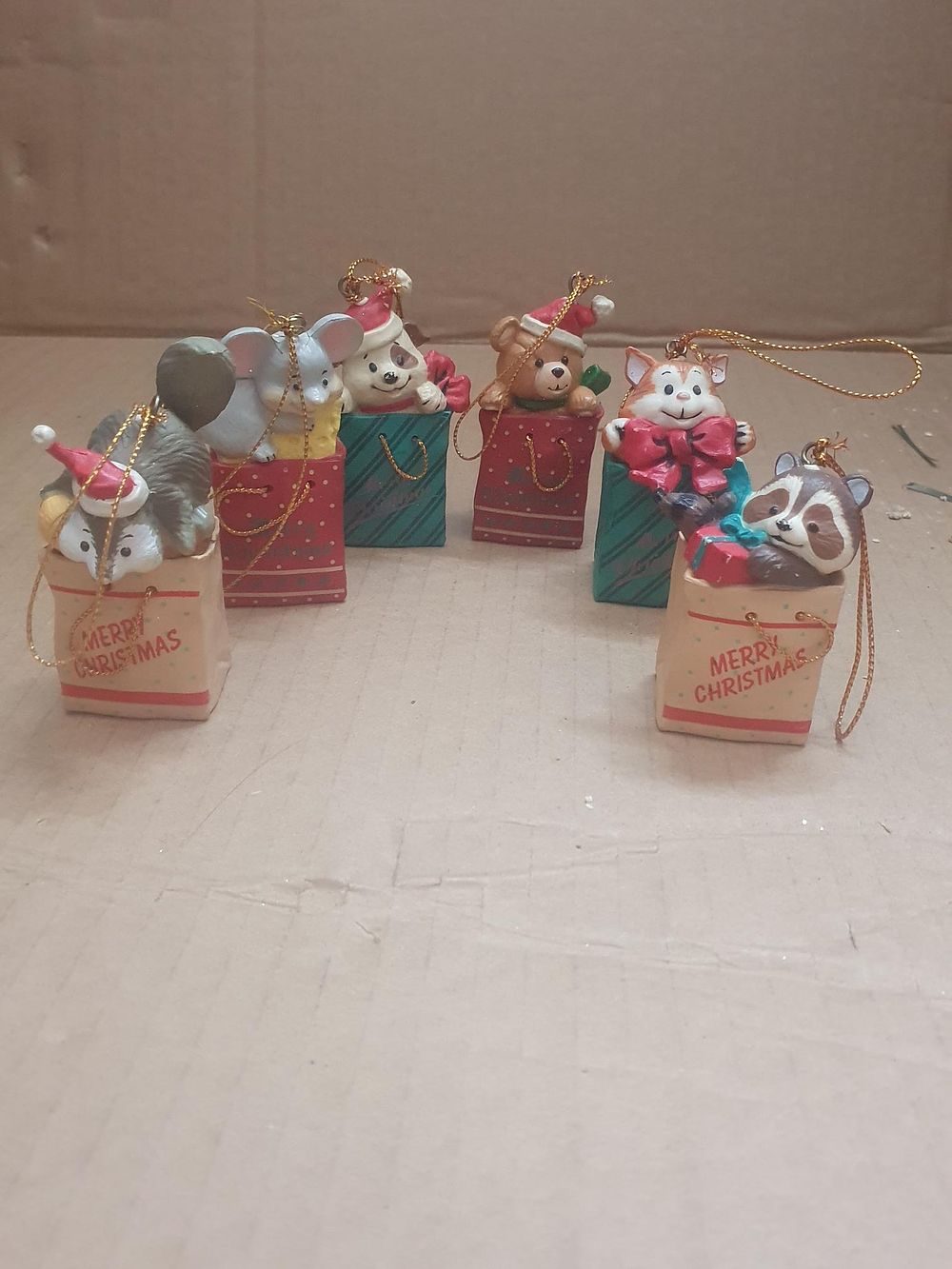 Lot 306: A Collection of Resin Animal Bag Buddies Christmas Ornaments