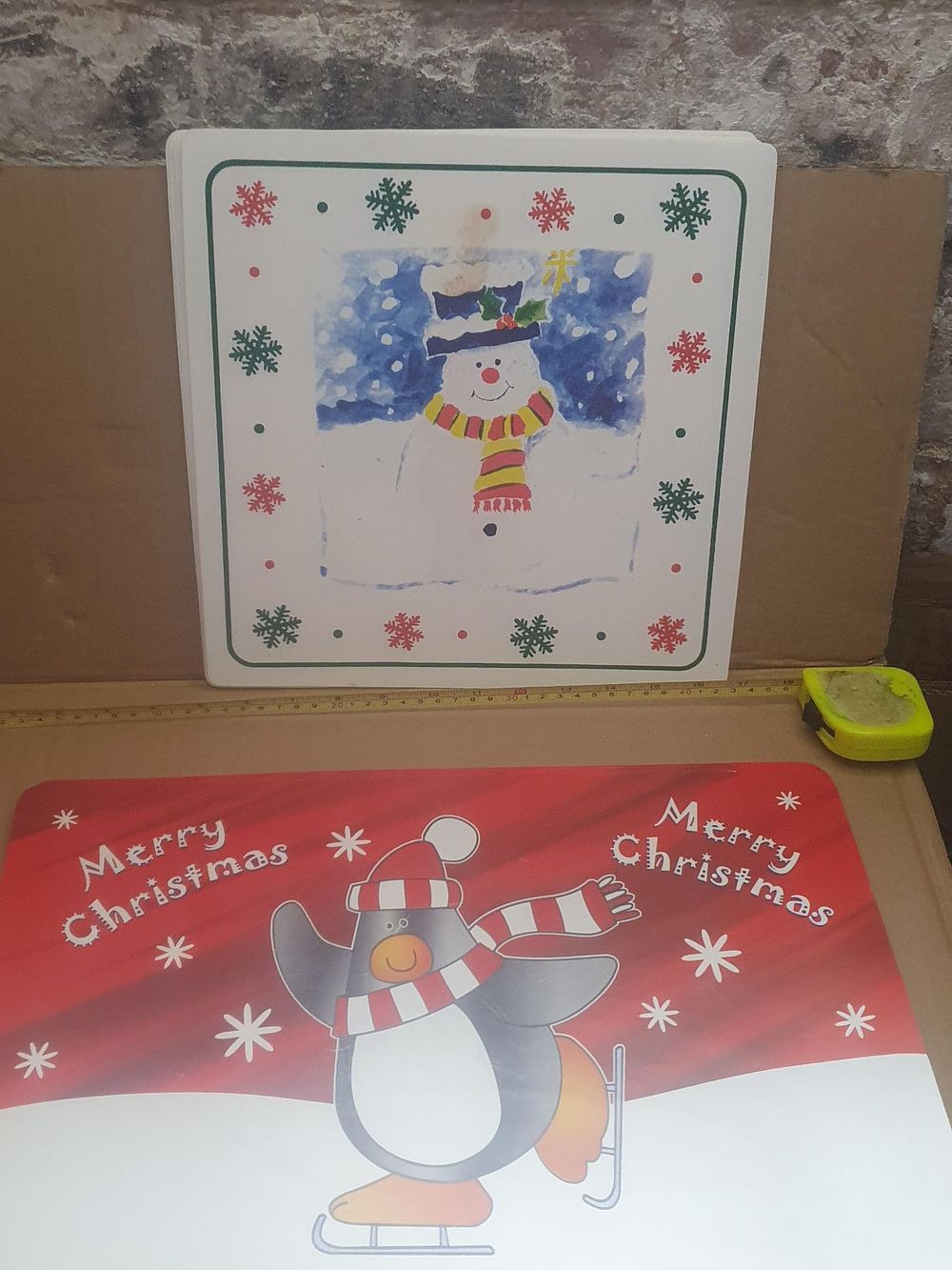 Lot 313: Seasonal Snowman and Penguin Christmas Place Mats