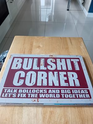 Novelty Metal Bullshit Corner Decorative Bar Sign. A rectangular novelty metal wall plaque 