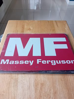 Massey Ferguson Metal Advertising Sign. A rectangular metal advertising wall sign for Massey 
