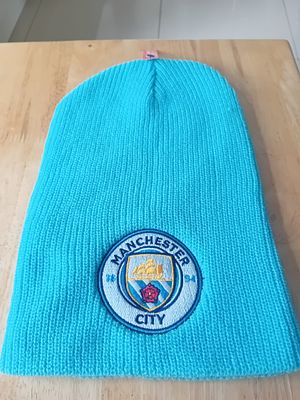 Manchester City Crest Core Beanie. This is an official Manchester City Football Club knitted 
