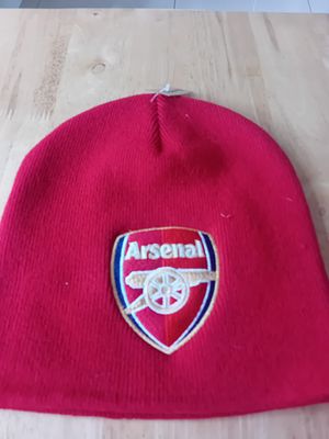 Arsenal FC Official Knitted Beanie Hat. This red knitted beanie hat is official Arsenal Football 