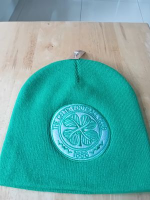 Official Celtic Football Club Green Knit Beanie Hat. This item is a green knit beanie hat 