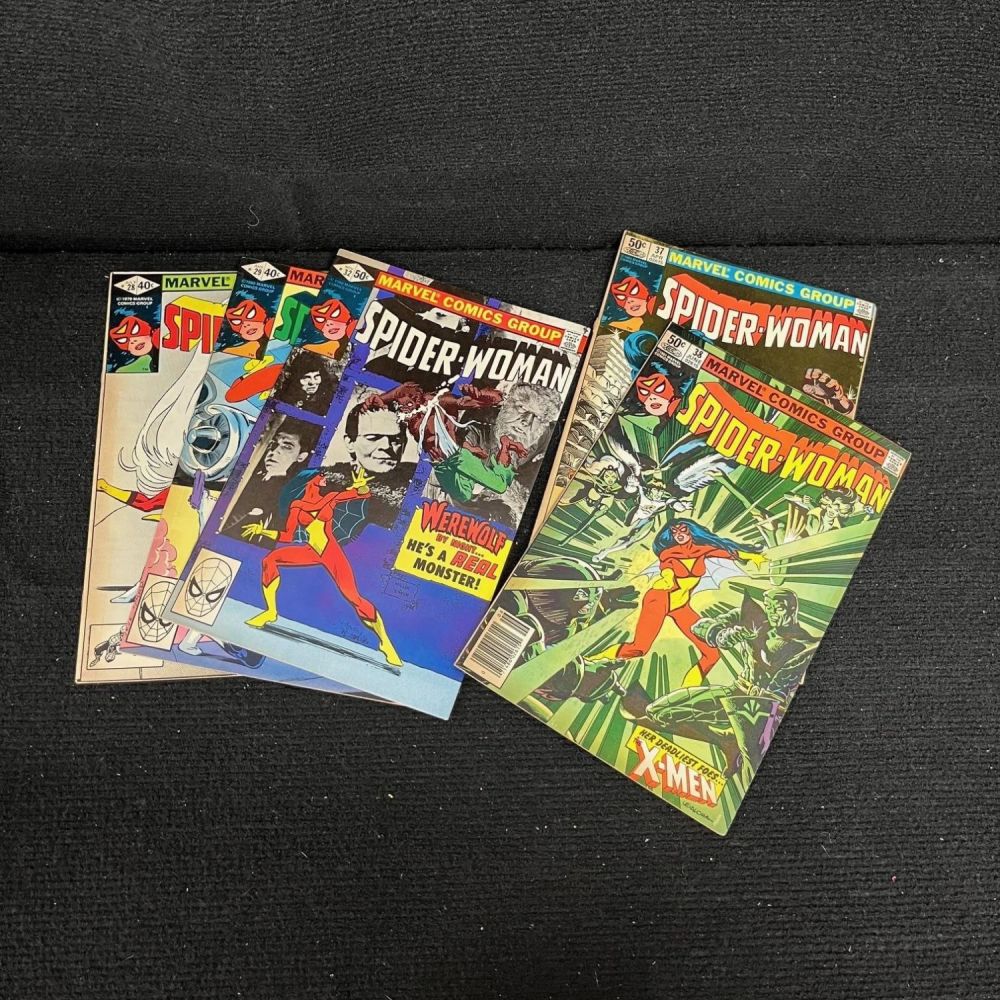 Lot 315: Spider-woman Comic Lot w/ X-men & WWBN App