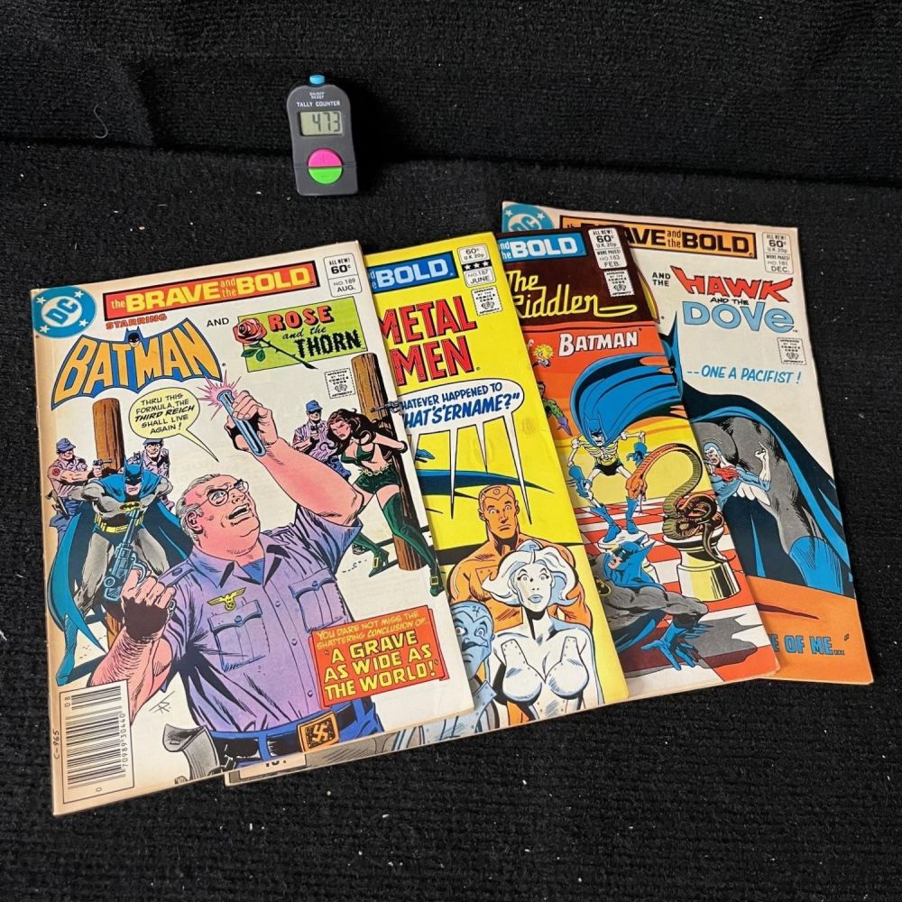 Lot 473: Batman in Brave & Bold Lot w/ Swamp Thing