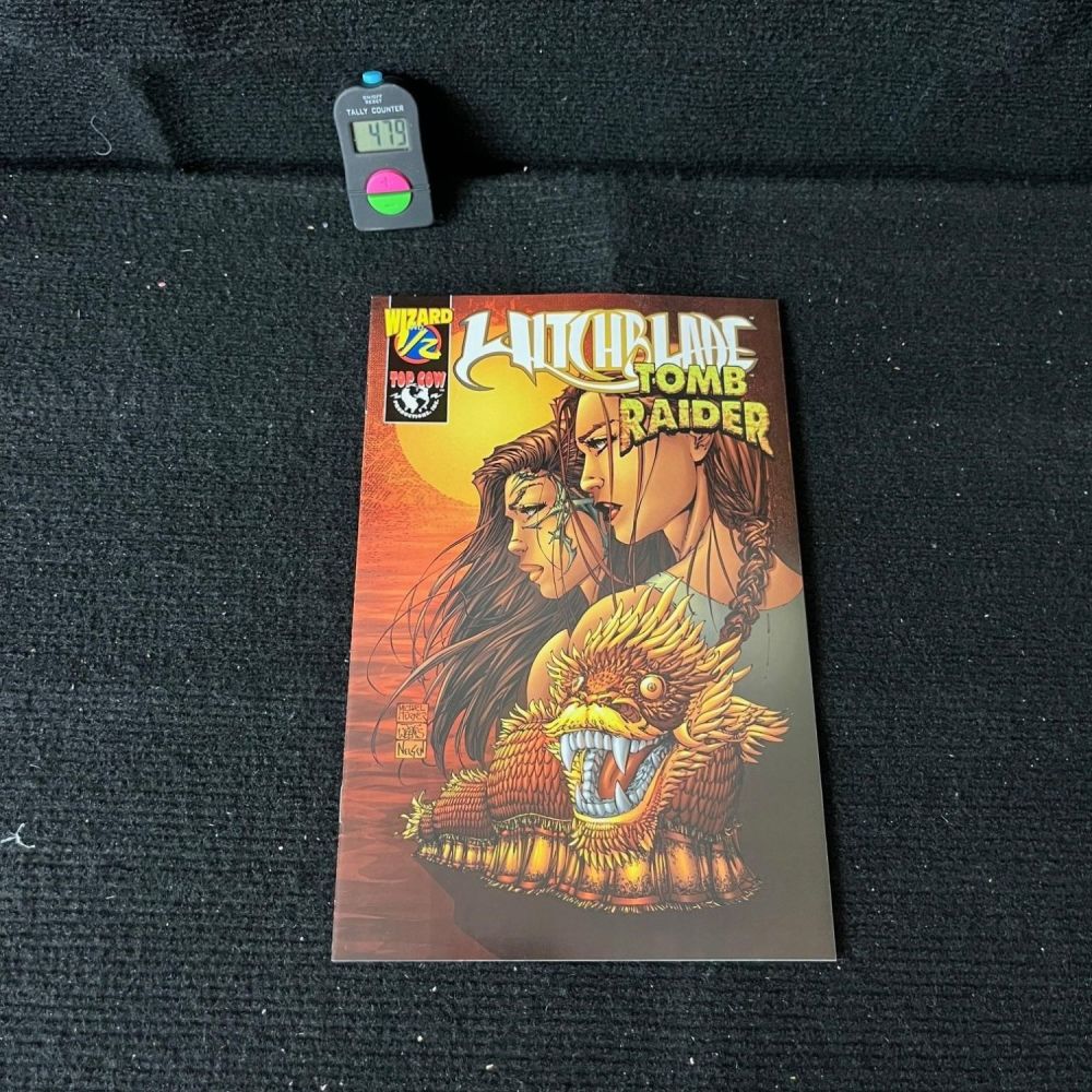 Lot 479: Witchblade & Tomb Raider Wizard 1/2 Promo Comic
