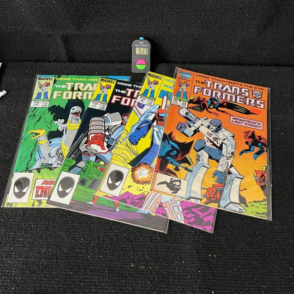 Lot 517: Transformers 7,8,9 25 Marvel Series