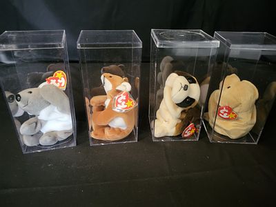 I00049 A Collection of Ty Beanie Babies. BID PER WHAT YOU SEE IN THE PHOTO, NOT THE AI GENERATED 