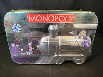 I00010 Monopoly Reading Railroad Collector's Edition Embossed Train Tin. BID PER WHAT YOU SEE IN 