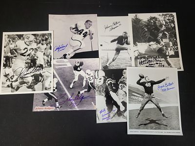 I01456 | A Collection of Seven Autographed 8x10 Photos of Heisman Trophy Winners. BID PER WHAT 