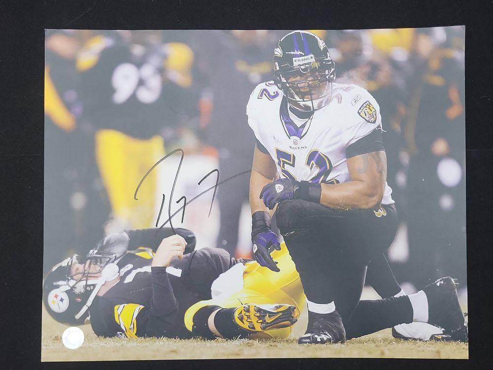 Lot 231: I01703 | Ray Lewis Signed Baltimore Ravens vs. Pittsburgh Steelers Color Photograph Authenticated by Schwartz Sports