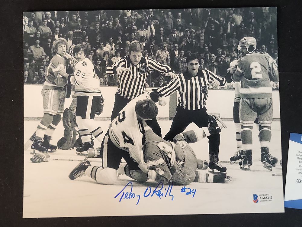 Lot 248: I00955 | Terry O'Reilly Signed Boston Bruins Action Photograph, Beckett Authenticated