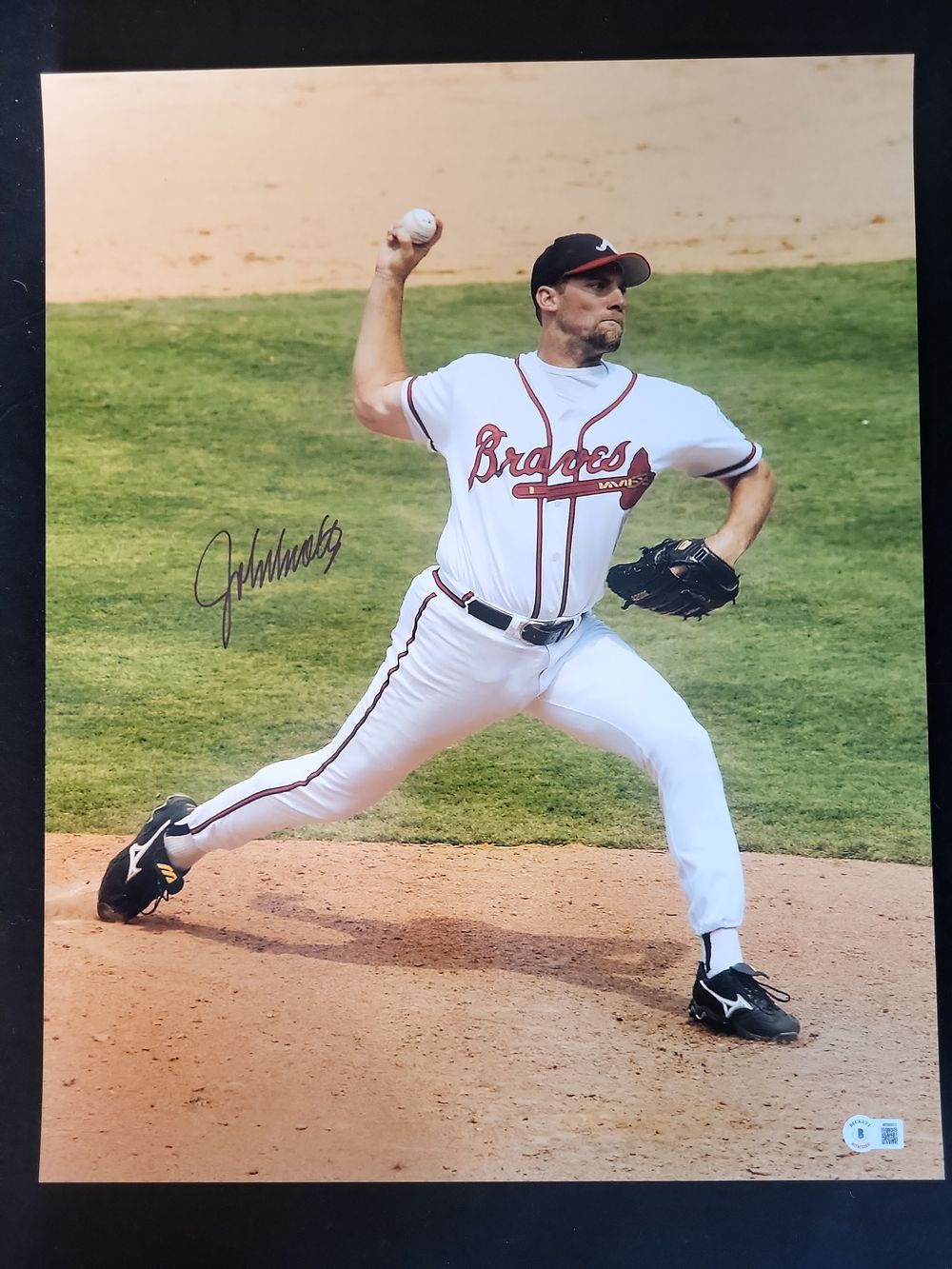 Lot 250: I00977 | John Smoltz Autographed Atlanta Braves 16x20, Beckett Witnessed Authentication
