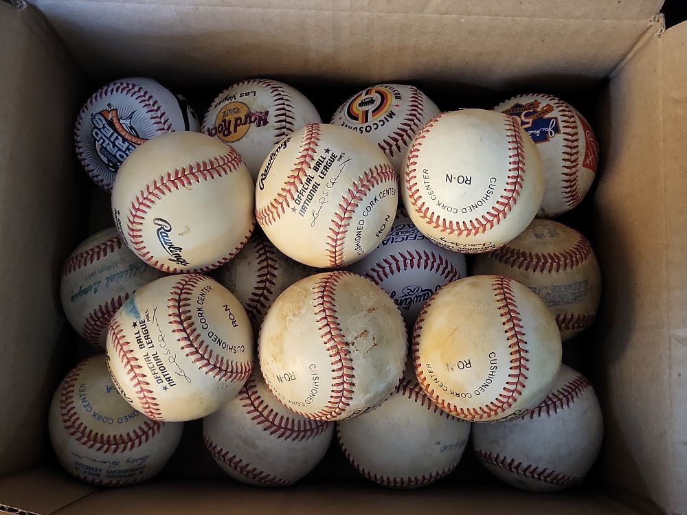 Lot 251: I00997 | Collection of Approximately 18 Mixed Baseballs Including Rawlings Official MLB and Commemorative Editions