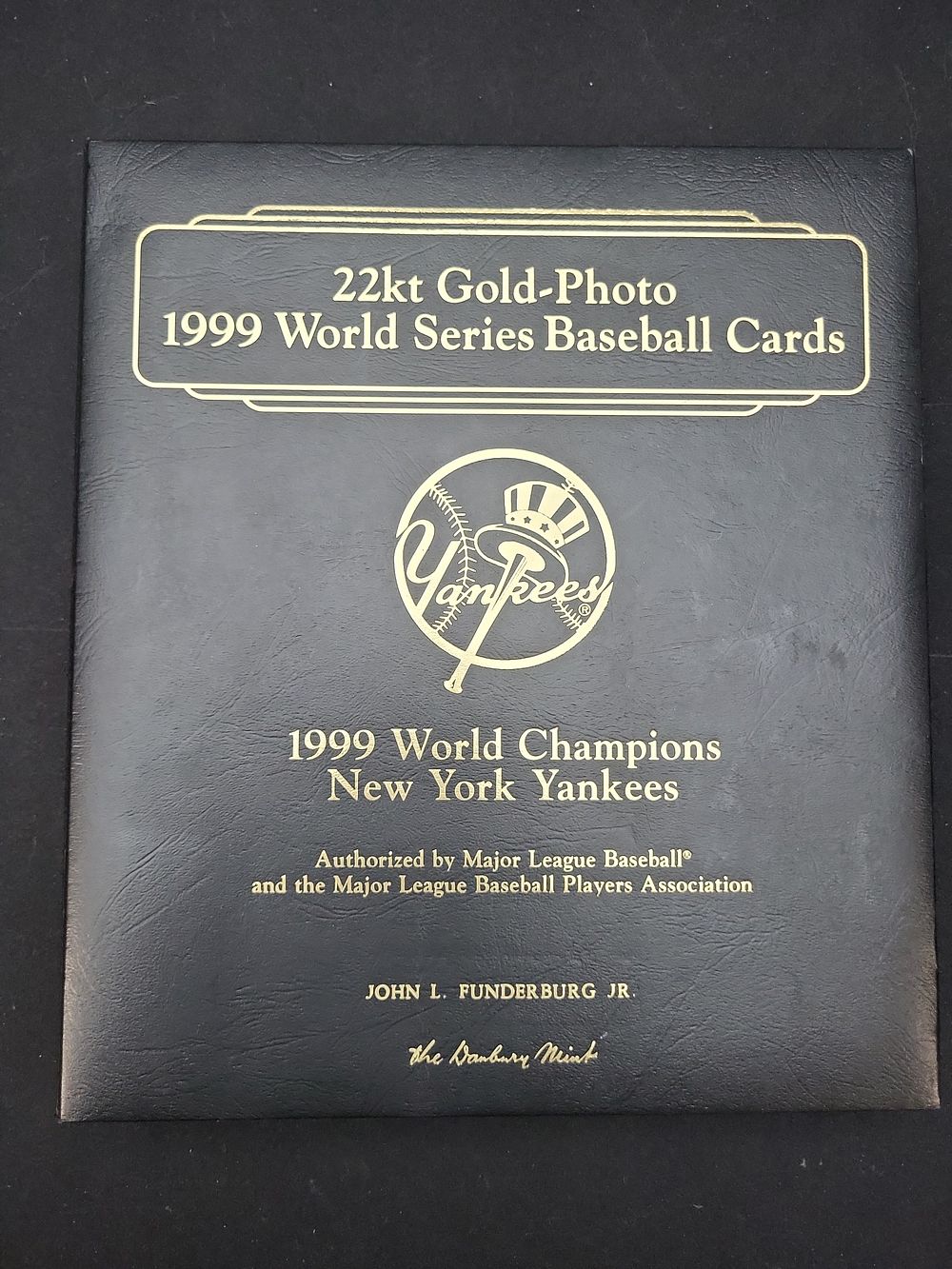 Lot 253: I01290 | A Collection of 1999 New York Yankees World Series Champions 22kt Gold-Photo Baseball Cards by The Danbury Mint