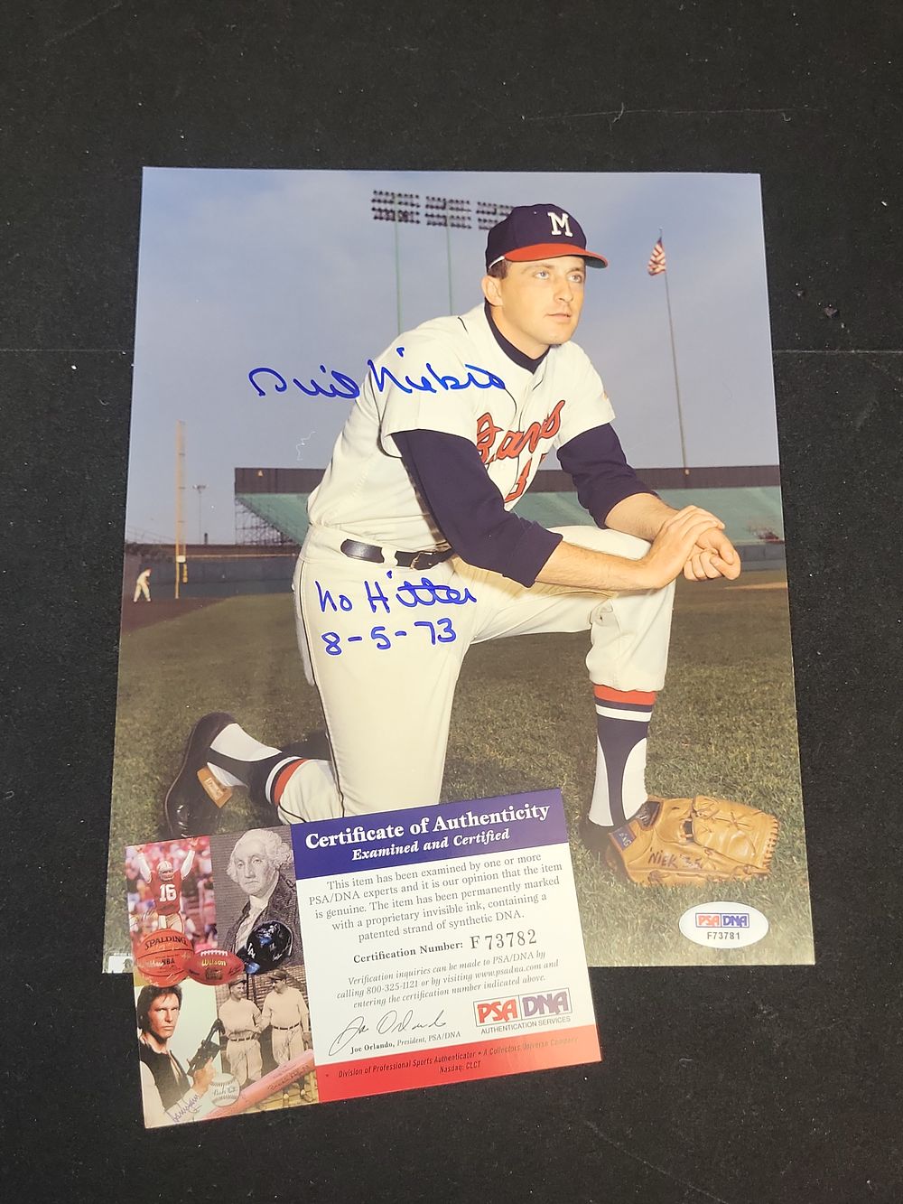 Lot 271: I01513 | Phil Niekro Autographed Milwaukee Braves Photograph with No-Hitter Inscription and PSA/DNA Authentication