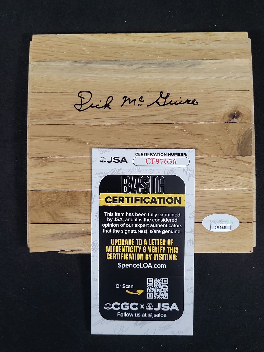 Lot 279: I01756 | Dick McGuire Autographed Basketball Court Flooring Segment with JSA Authentication