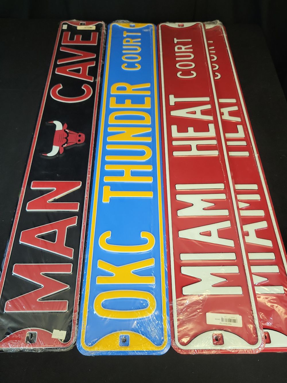 Lot 297: I01390 | Set of Four NBA Team Embossed Metal Decorative Street Signs