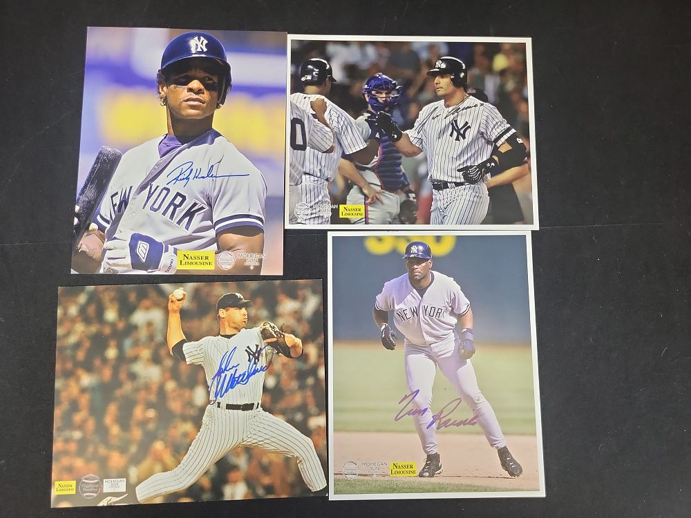 Lot 306: I01549 | Lot of Four Autographed New York Yankees 8x10 Color Photographs Featuring Rickey Henderson, Tino Martinez, John Wetteland, and Tim Raines
