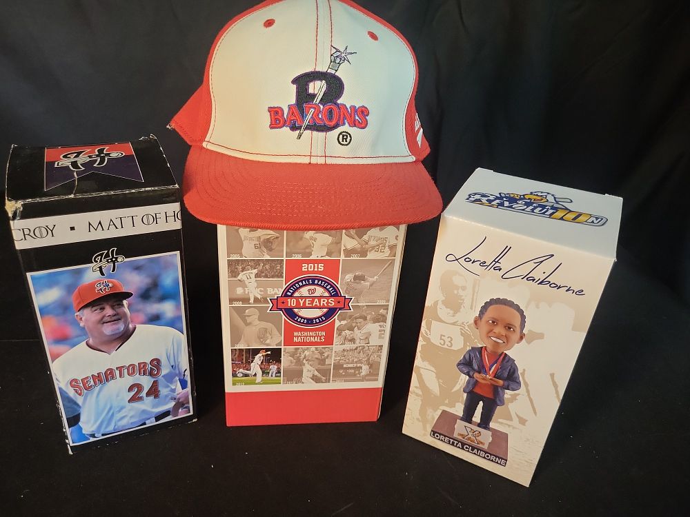 Lot 311: I01178 | Matt LeCroy, Jayson Werth, and Loretta Claiborne Bobbleheads and Barons Cap, Unauthenticated