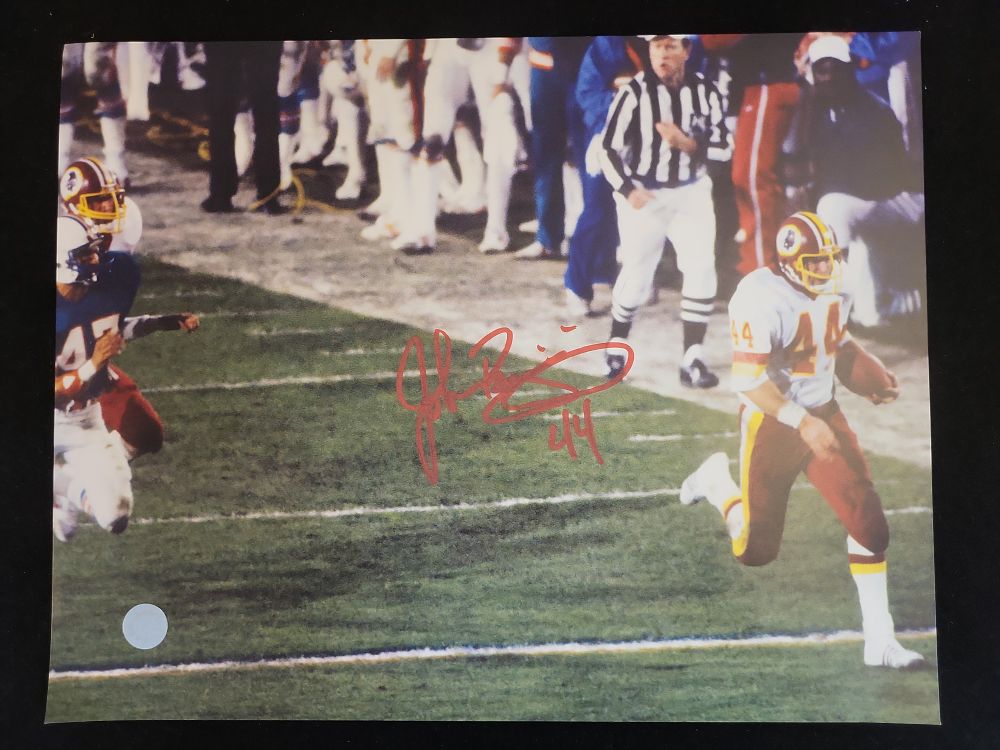 Lot 313: I01242 | John Riggins Autographed Washington Redskins 8x10 Action Photograph, Schwartz Sports Authenticated