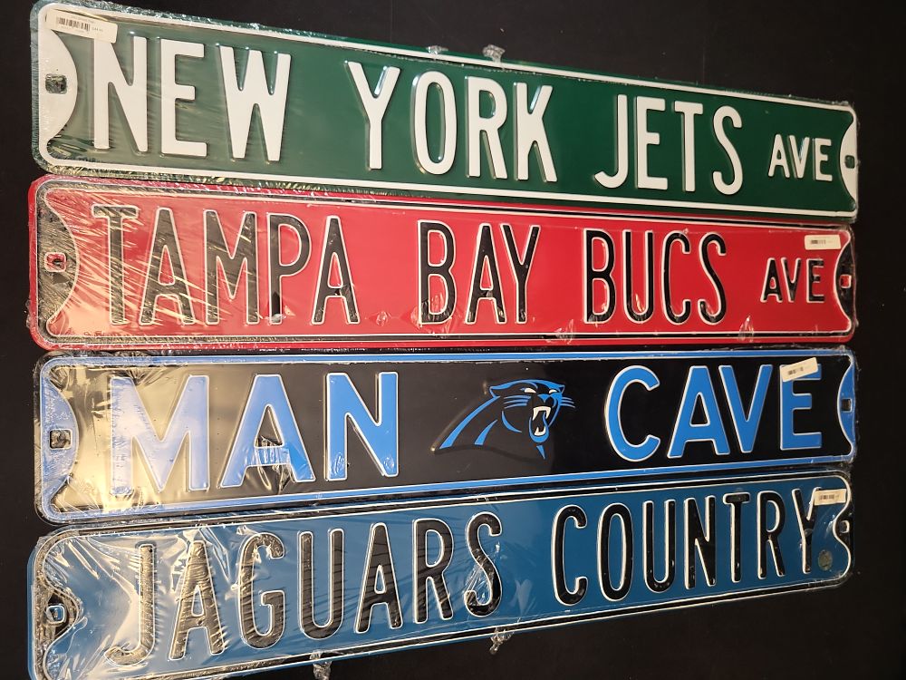 Lot 320: I01389 | A Lot of Four Officially Licensed NFL Embossed Metal Street Signs