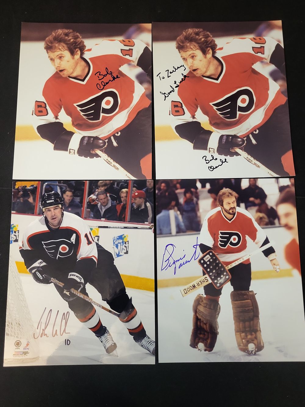 Lot 323: I01447 | A Lot of Four Autographed Philadelphia Flyers 8x10 Photographs Including Bobby Clarke, Bernie Parent, and John LeClair