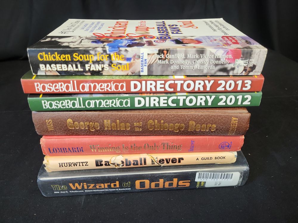 Lot 343: I01340 | A Collection of Sports Books Including Baseball America Directories and Biographies (DJ)