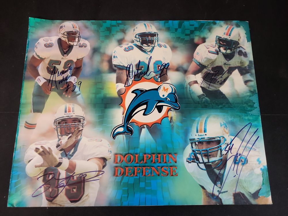Lot 353: I01951 | Multi-Signed Miami Dolphins Dolphin Defense Autographed Color Composite Photograph