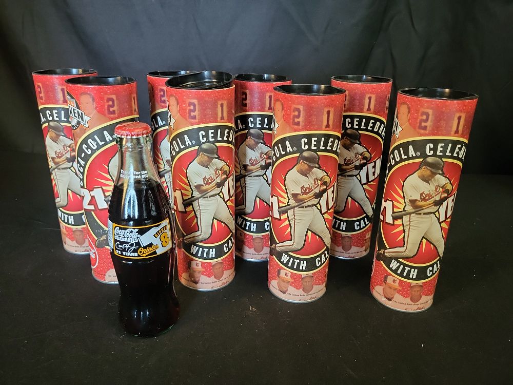 Lot 365: I00925 | Cal Ripken Jr., Commemorative Coca-Cola Bottle and Canister Collection, Unauthenticated