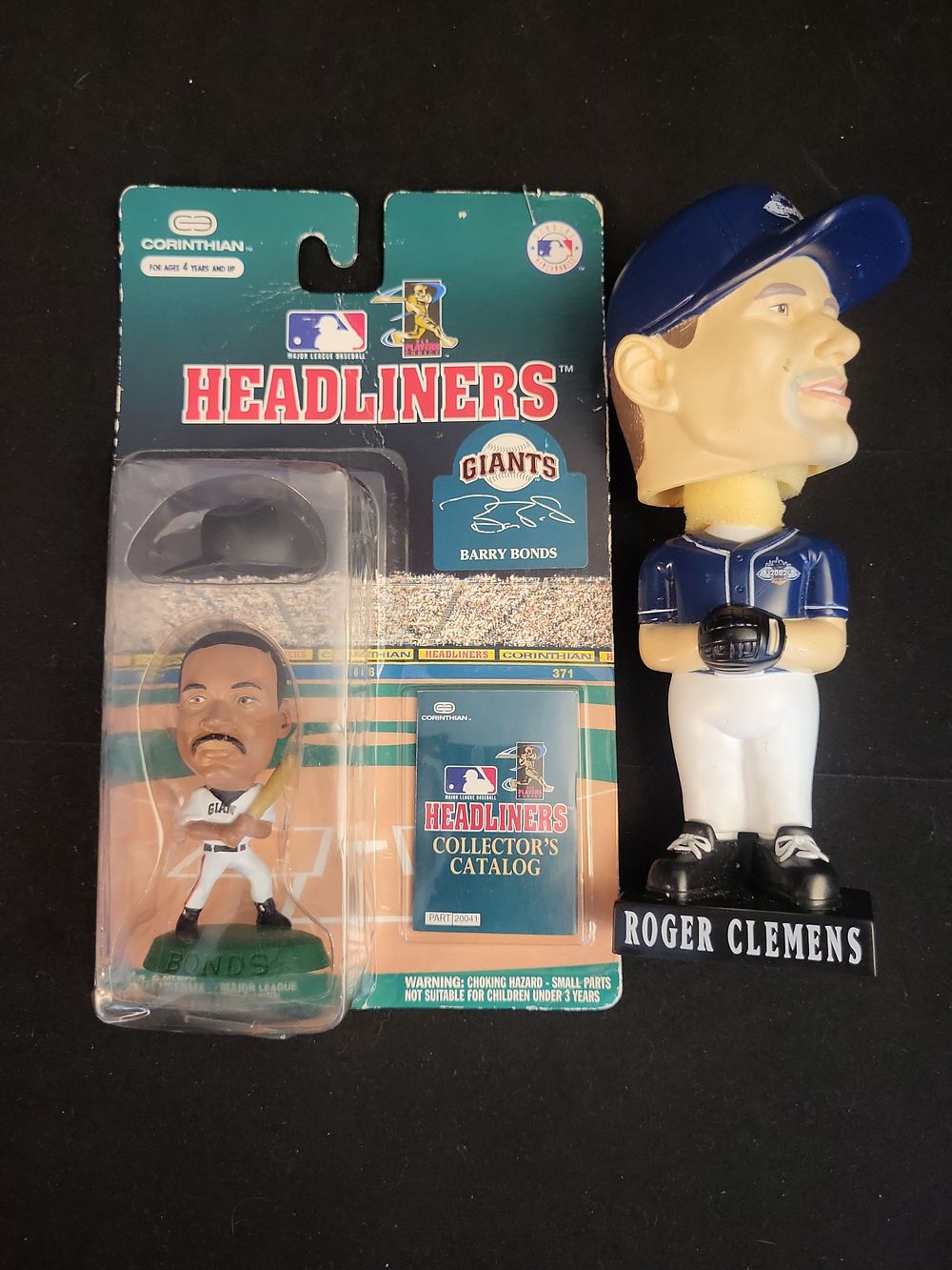 Lot 367: I00933 | A Pair of Roger Clemens and Barry Bonds MLB Collectible Figures, Unauthenticated