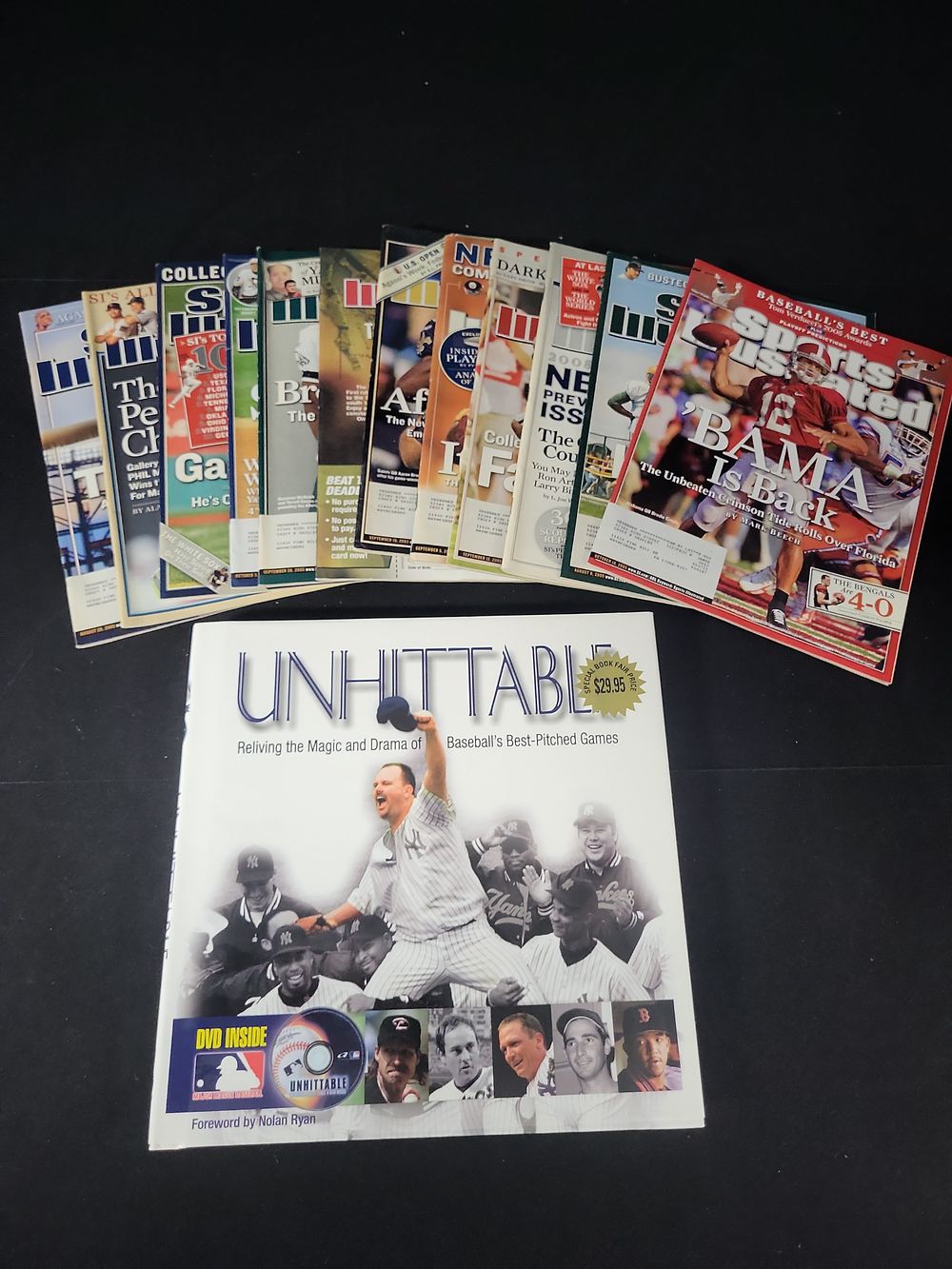 Lot 377: I01327 | A Baseball History Book with DVD and an Assortment of Sports Illustrated Magazines