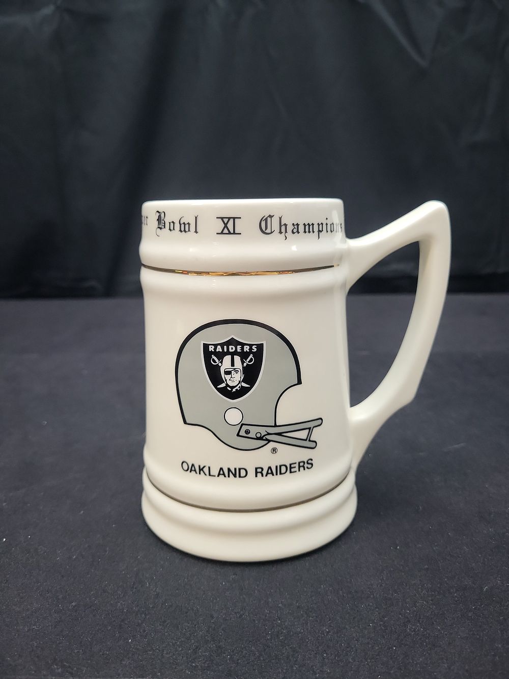 Lot 384: I01259 | Oakland Raiders Super Bowl XI Champions Commemorative Ceramic Stein