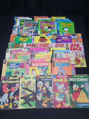 I02092 | A Collection of Approximately 40-50 Vintage Comic Books Including Walt Disney, Dell 