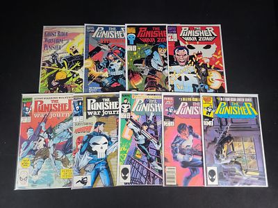 I02116 | A Collection of 9 Vintage Marvel Punisher Comic Books Including Premiere and Key Issues. 