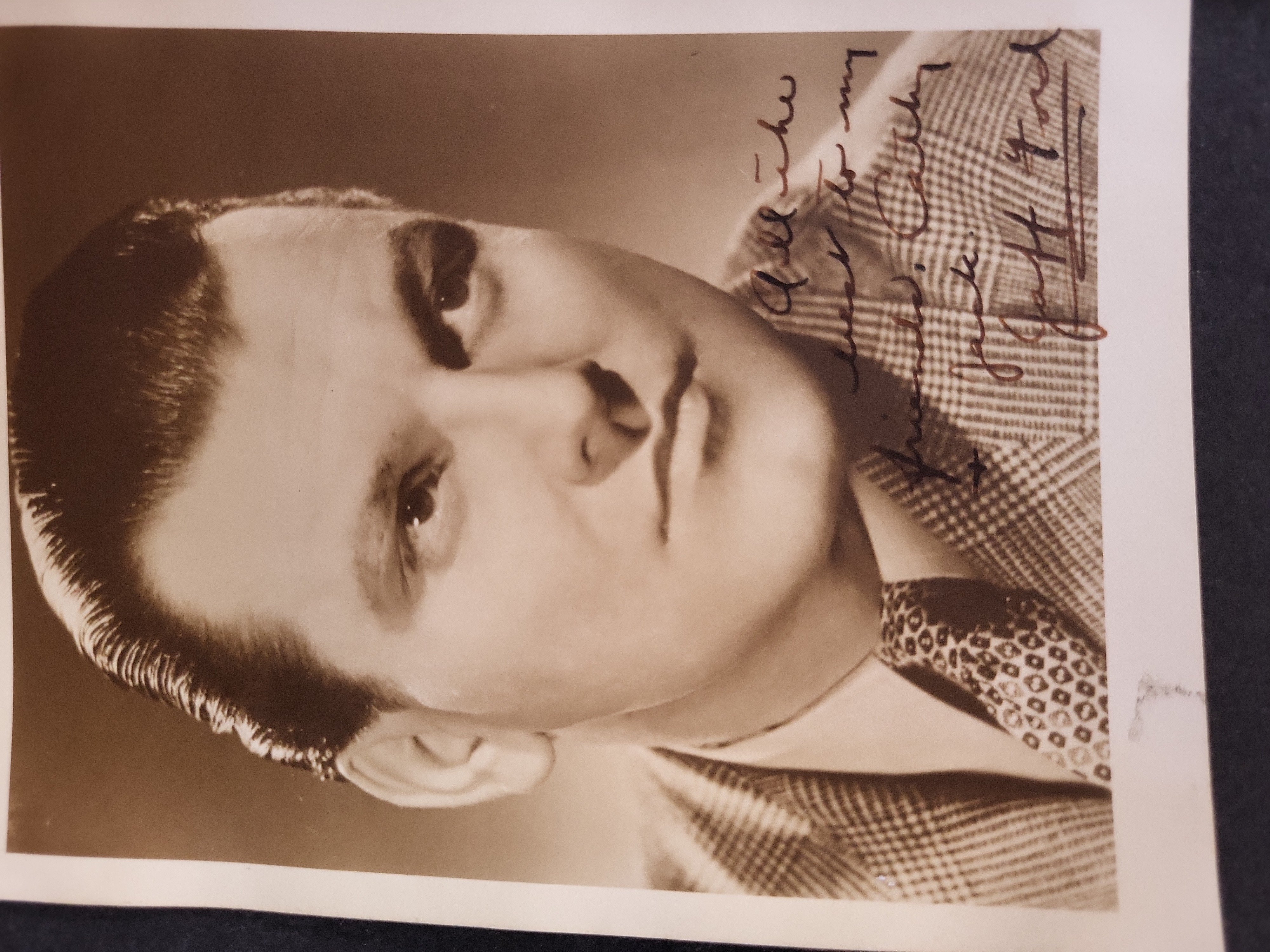 I03403 | A Collection of Seven Autographed Publicity Photographs and Memorabilia Featuring Film, Television, and Sports Personalities