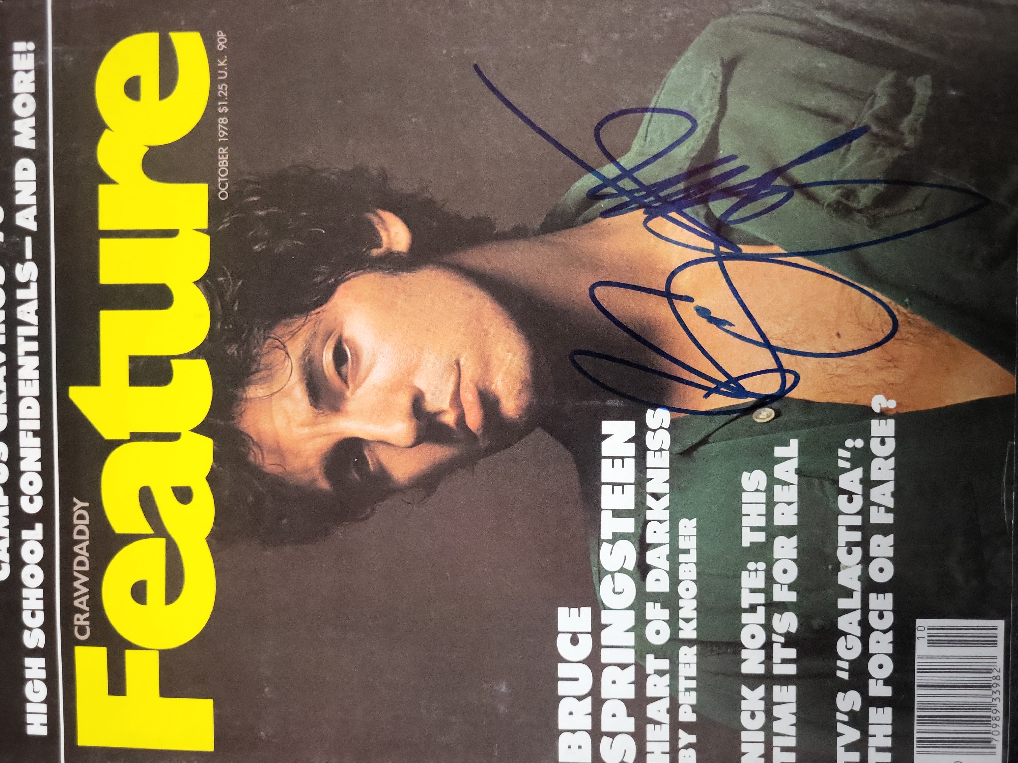 I03441 | Two Autographed Music Items Featuring Bruce Springsteen and George Strait