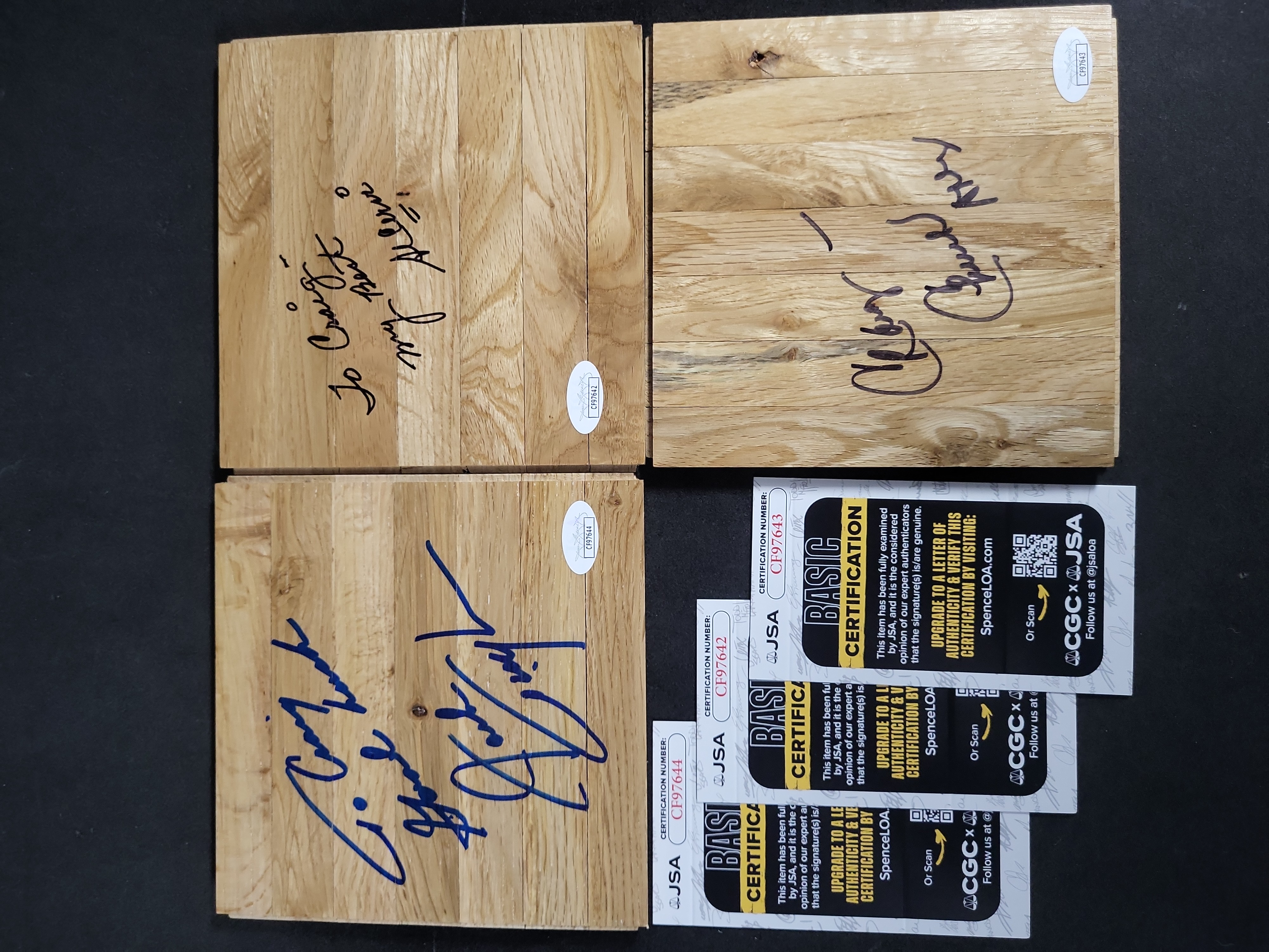 I03434 | A Trio of Autographed Basketball Court Floor Segments Featuring Al Cervi, Chuck Daly, and Jack Twyman with JSA Authentication