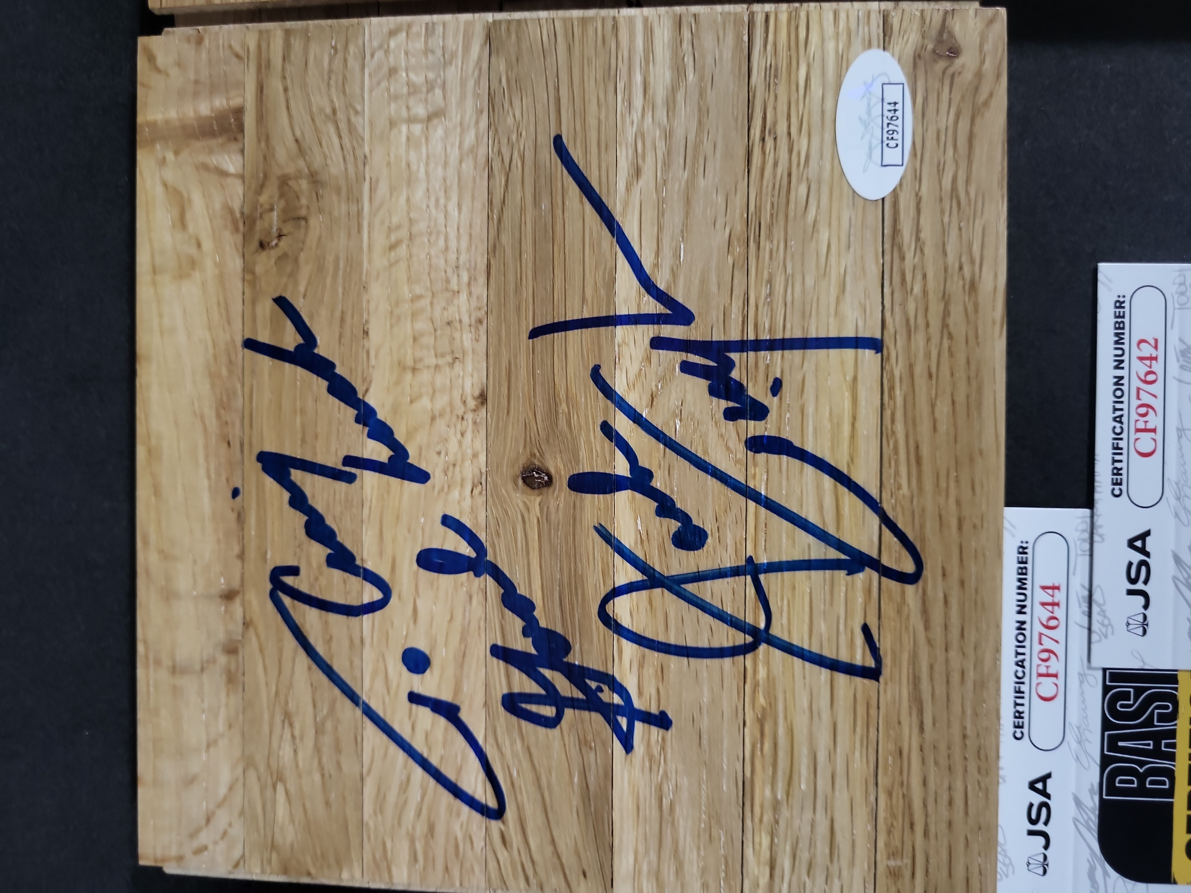 I03434 | A Trio of Autographed Basketball Court Floor Segments Featuring Al Cervi, Chuck Daly, and Jack Twyman with JSA Authentication