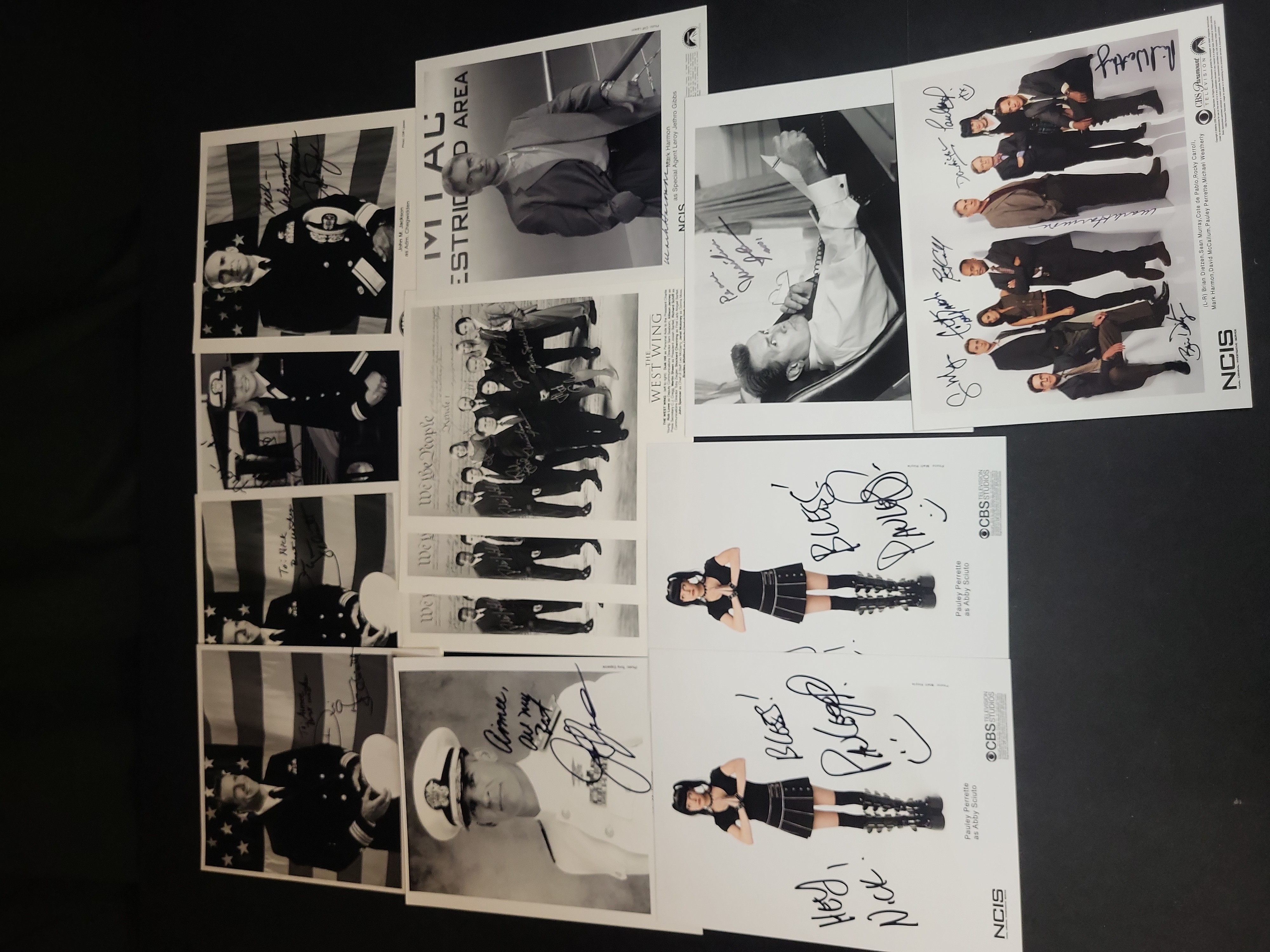 I03030 | A Collection of Autographed Promotional Television Photographs Including The West Wing, NCIS, and JAG