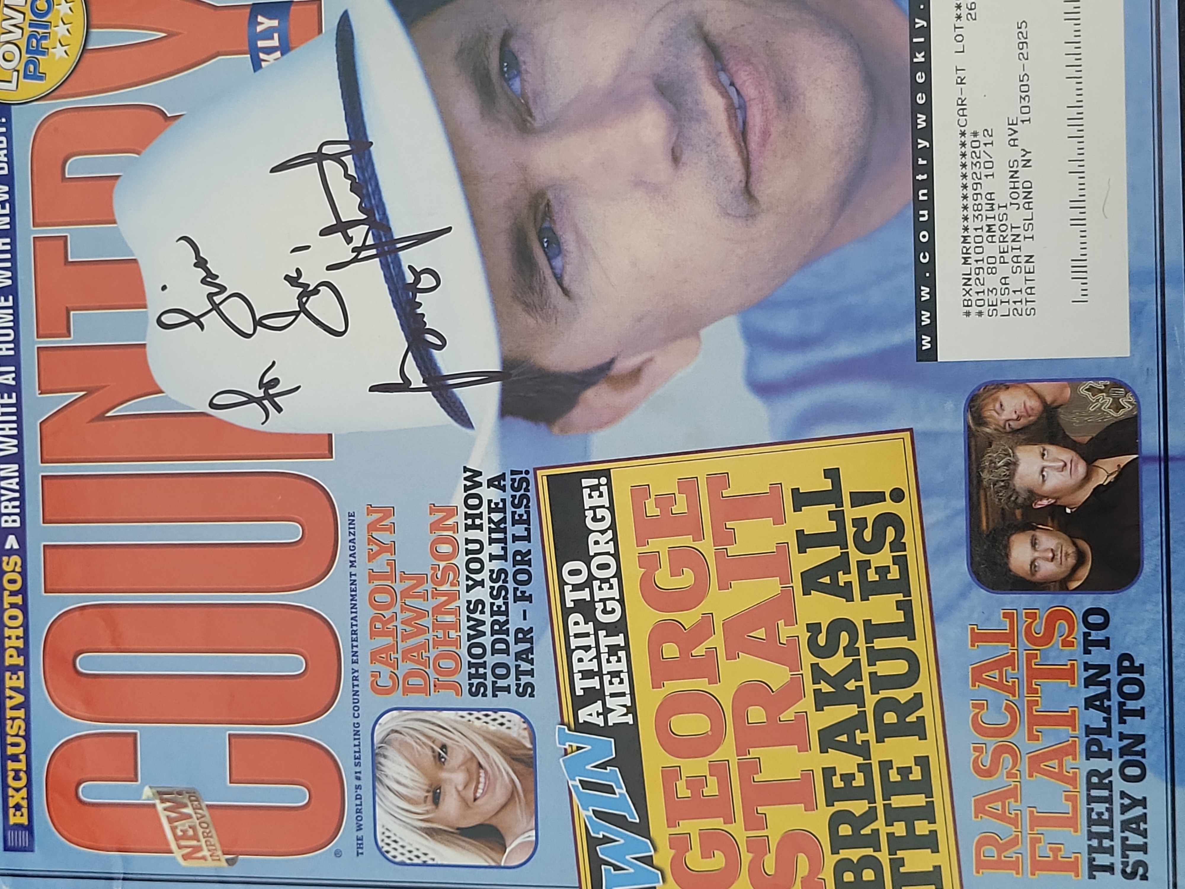 I03364 | Two Autographed Music Magazines Featuring George Strait and Bruce Springsteen