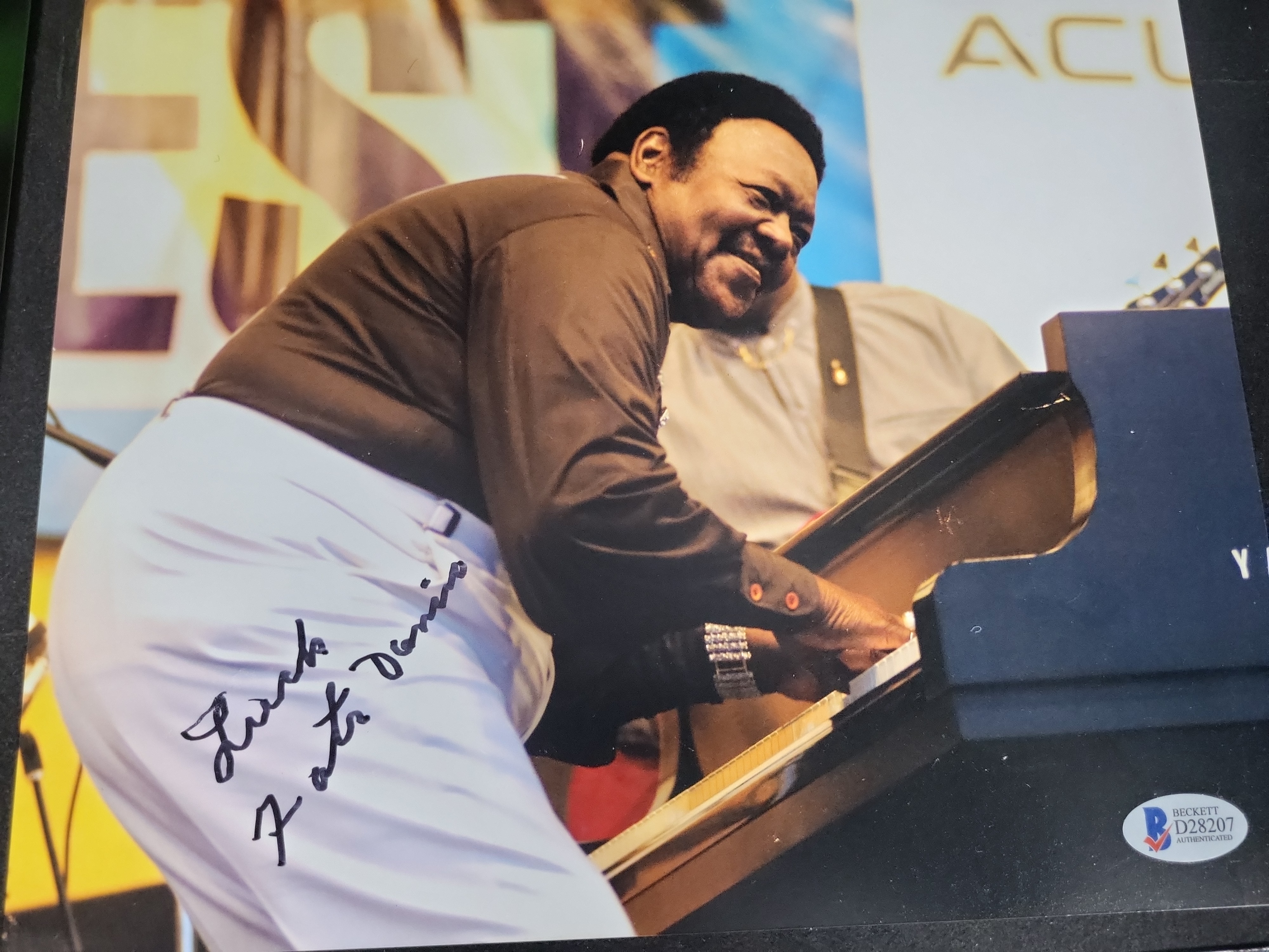 I03412 | Three Autographed Celebrity Photographs including Michael Caine, Fats Domino, and Paul Feig