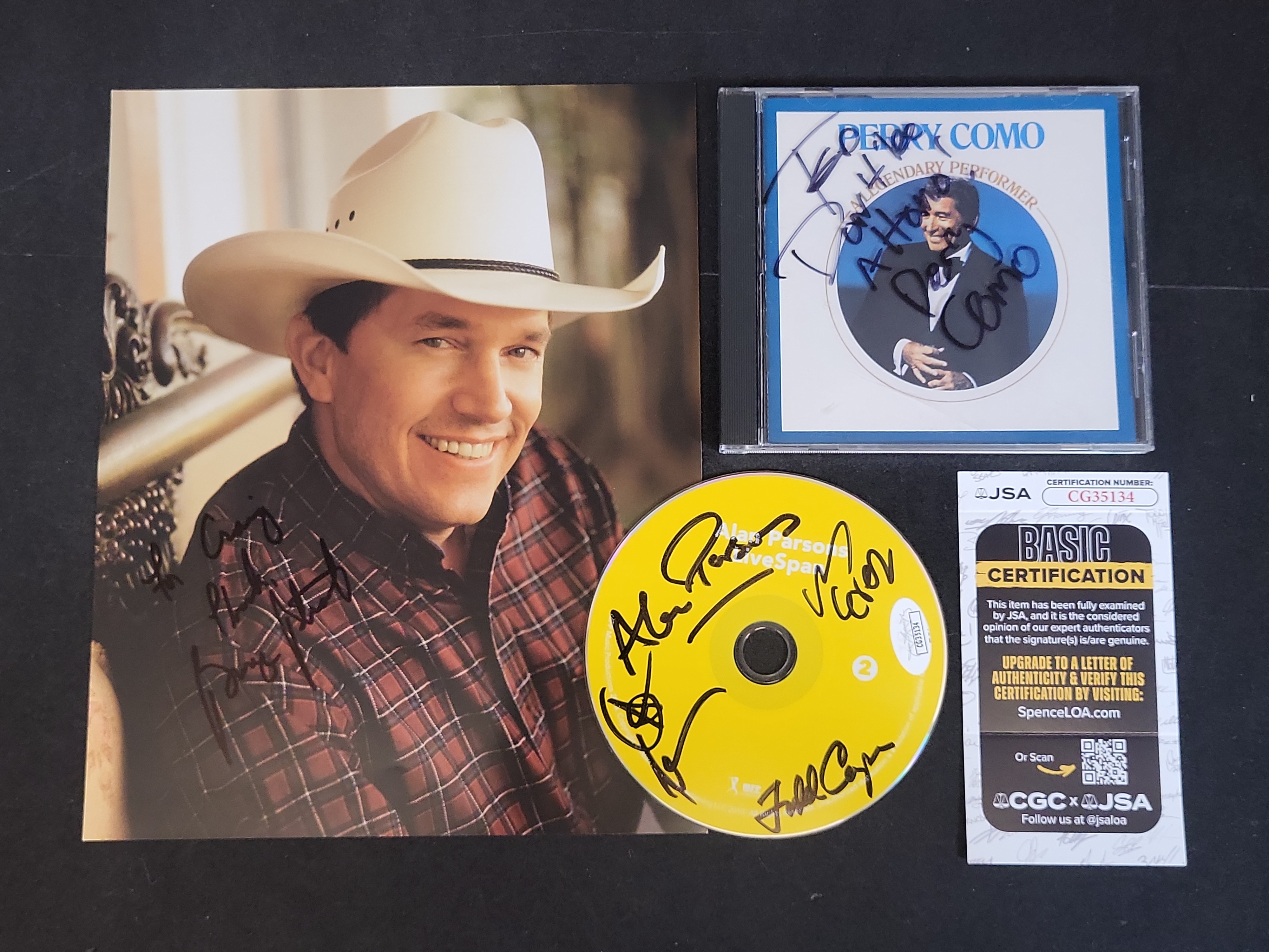 I03388 | A Trio of Autographed Music Memorabilia Including George Strait, Perry Como, and Alan Parsons