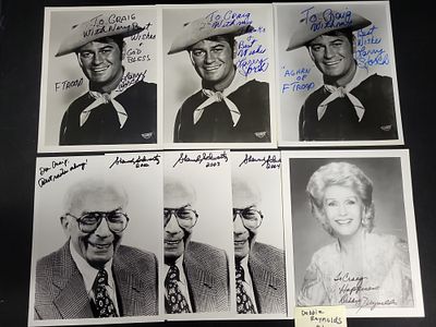 I03390 | A Collection of Seven Autographed Publicity Photographs Featuring Larry Storch 
