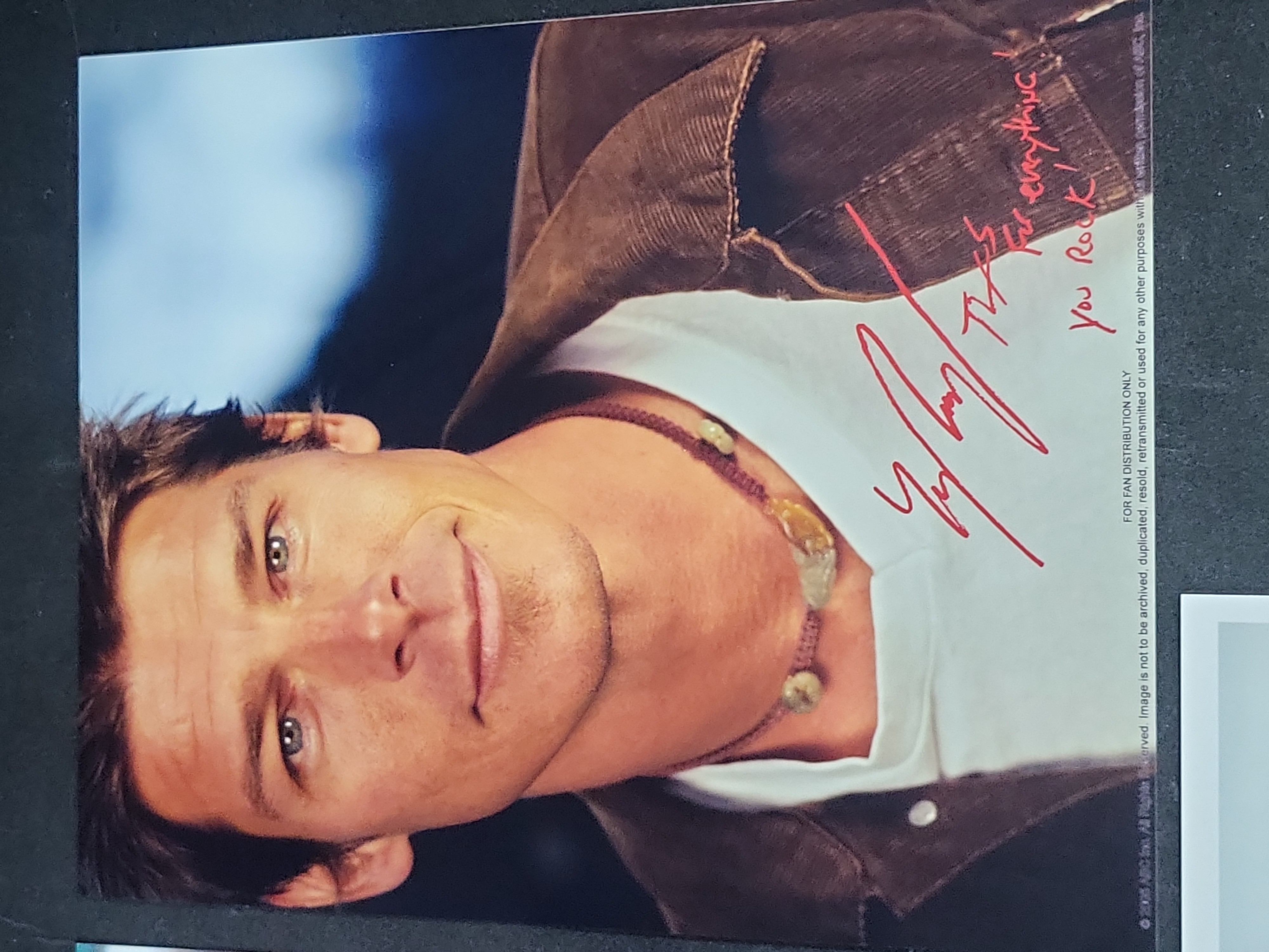 I03389 | Three Autographed Television and Film Publicity Photographs Featuring Ty Pennington, Tom Selleck, and Brian Presley