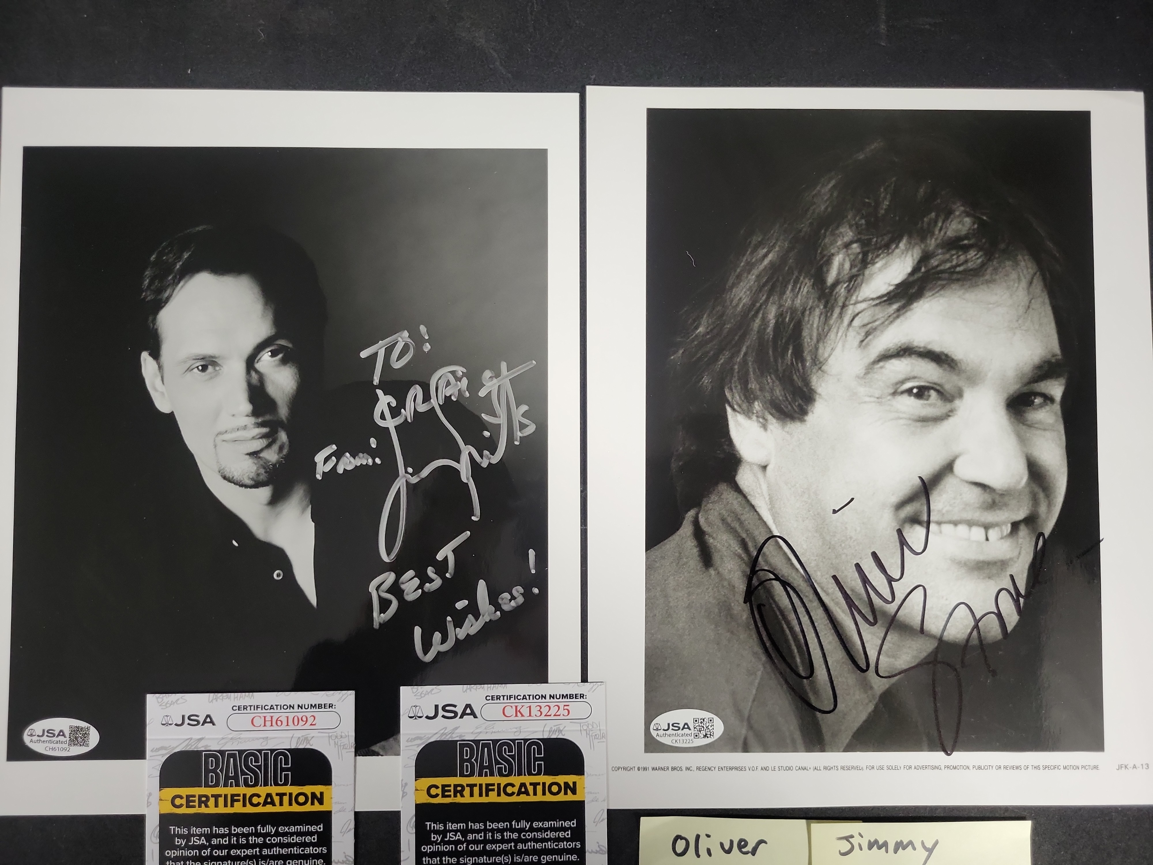 I03400 | Two Jimmy Smits and Oliver Stone JSA Authenticated Autographed Photographs