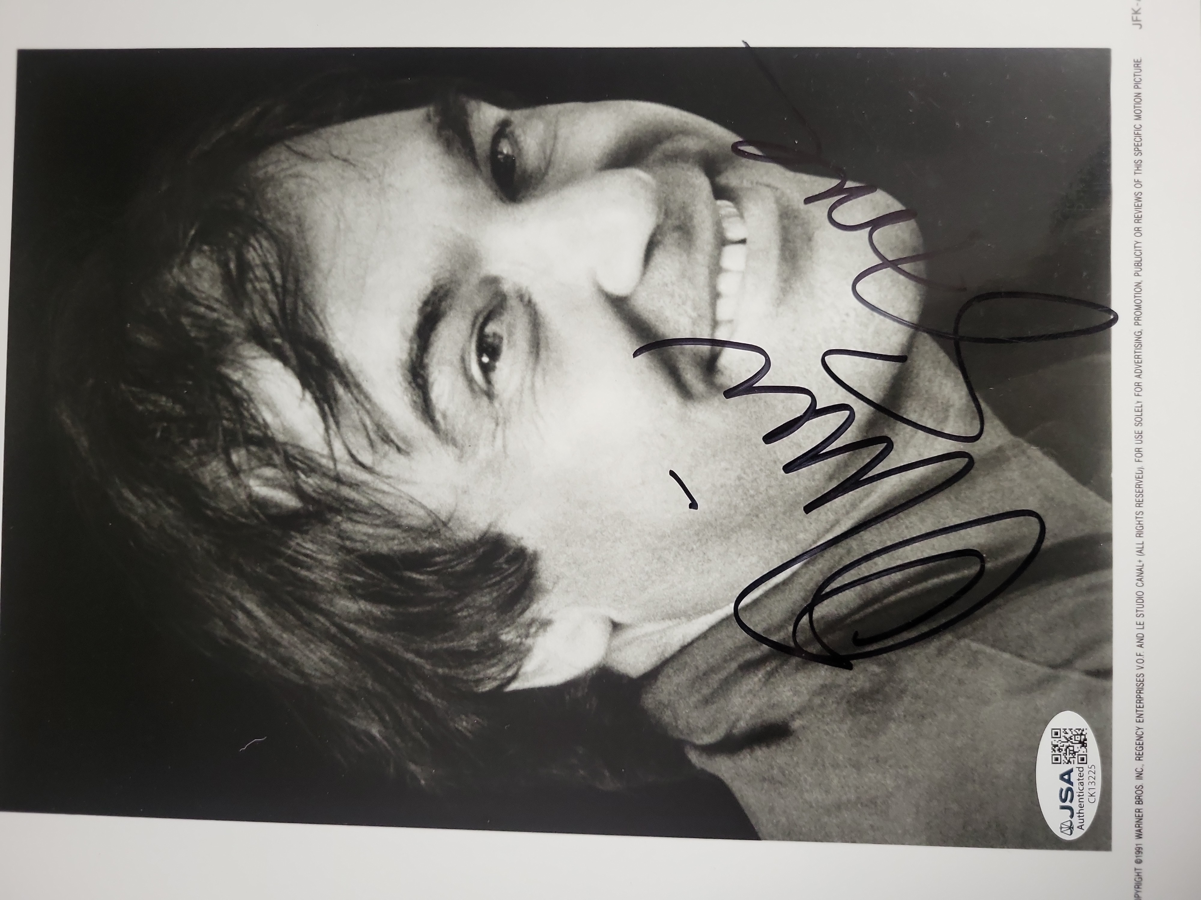 I03400 | Two Jimmy Smits and Oliver Stone JSA Authenticated Autographed Photographs
