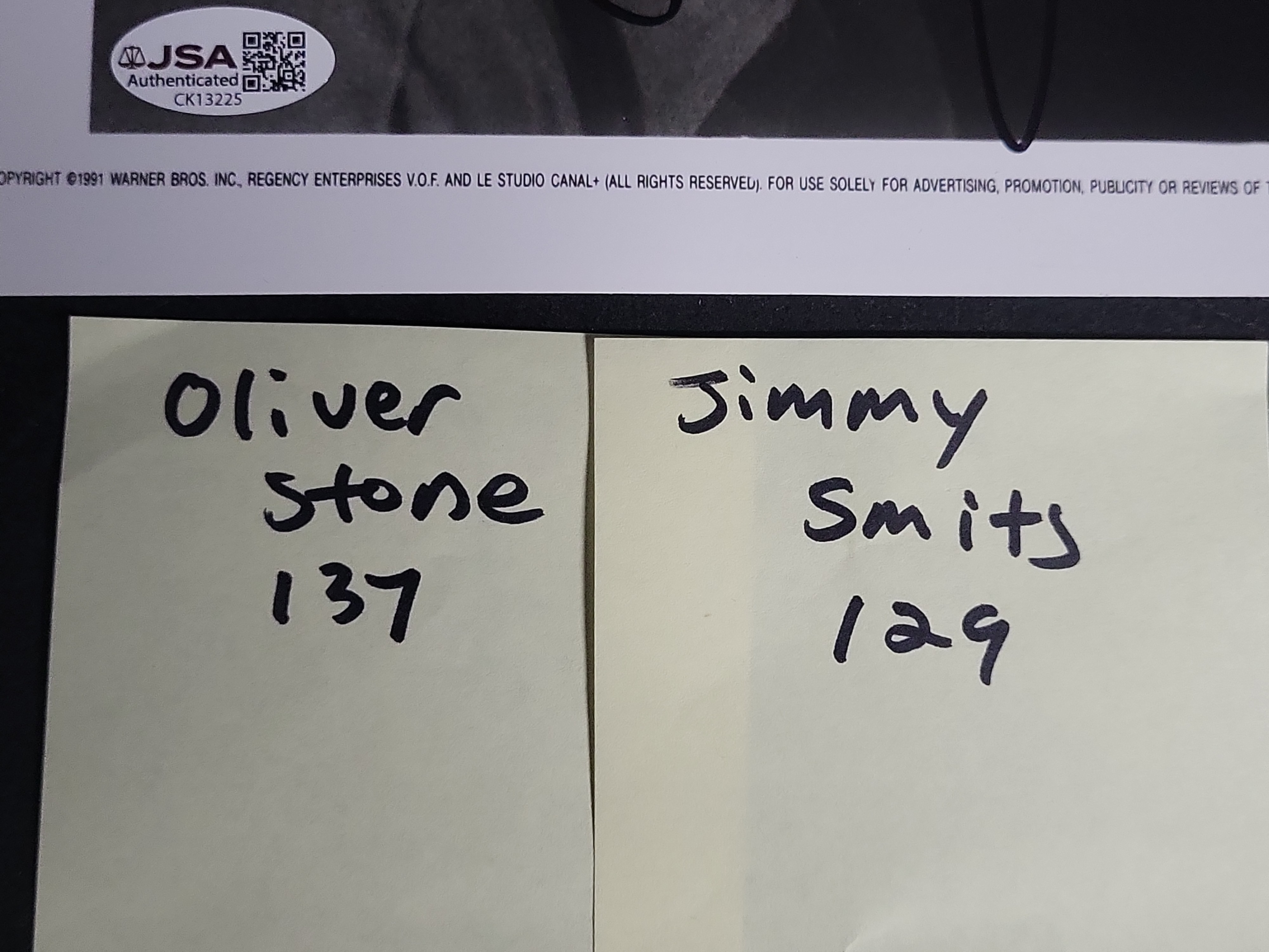 I03400 | Two Jimmy Smits and Oliver Stone JSA Authenticated Autographed Photographs